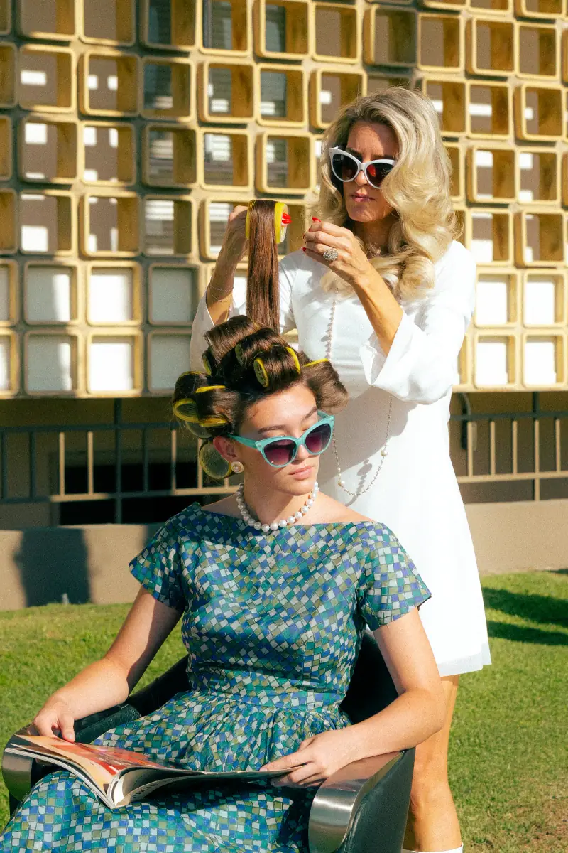 Editorial hair styling in front of the breeze-block screen, Palm Springs