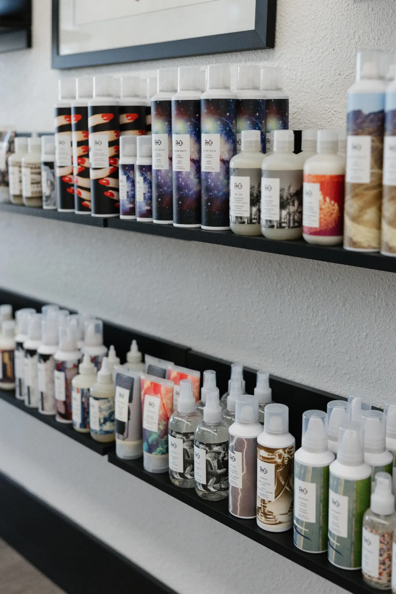 The R+Co product shelf at angelajoneshair, Palm Springs
